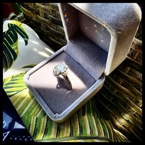 Elegant Silver Ring with Prong Setting and Clear Stone